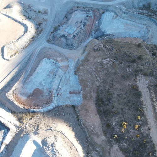 Ore Stockpiles with Crusher (upper left)